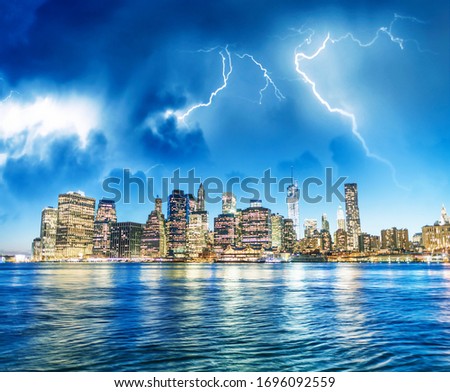 Storm coming towards New York City skyline, USA.