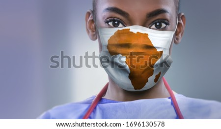 AFRICA - Coronavirus surgical mask doctor wearing face protectiv Royalty-Free Stock Photo #1696130578