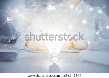 Social network theme hologram over woman's hands writing background. Concept of international people connect. Double exposure