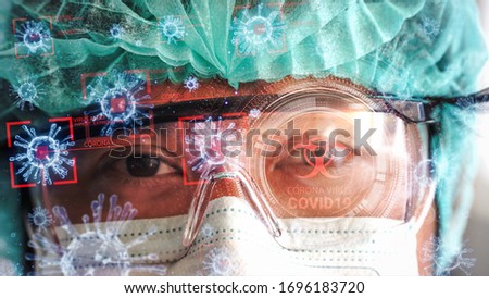 Medical lab worker analyzing Coronavirus - viruses of the Corona family rotating and moving  as dangerous flu strain cases as a pandemic medical health risk concept 