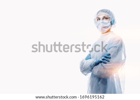 female doctor in medical mask on the face and gloves on a white background