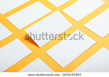 business cards on a colored background top view. Place to insert text
