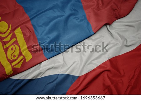 waving colorful flag of czech republic and national flag of mongolia. macro