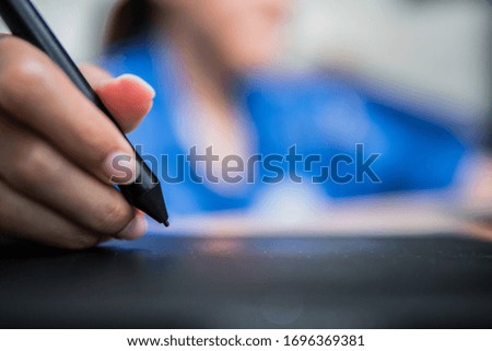 Pen with a graphic tablet (Gadget for art.) of the designer.