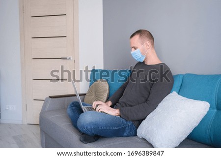 Man working online because of corona virus, concept of corona virus quarantine. Working and staying at home.