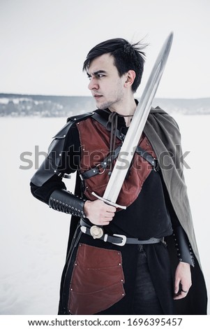 winter knight with a sword