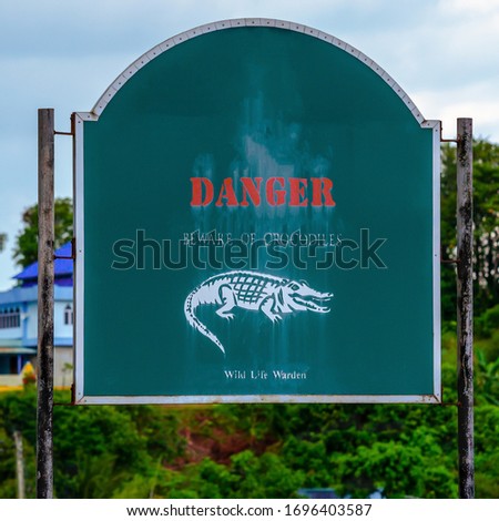 danger crocodiles, dangerous wildlife, announcement board
