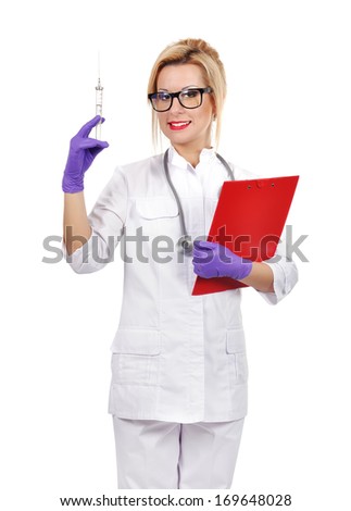 happy female doctor with syringe and clipboard