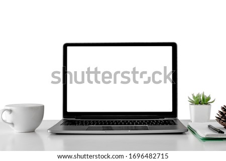 Mockup laptop devices isolated on white background. personal computer notebook white screen. and coffee cup, houseplant, notepaper as a desk