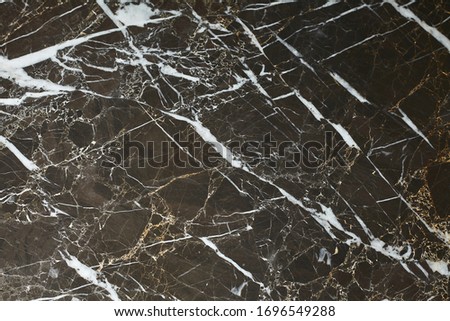 Beautiful dark grey marble with white veins. Abstract texture and background