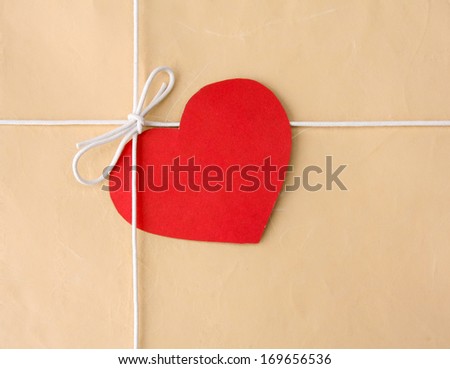 Red heart on a gift box