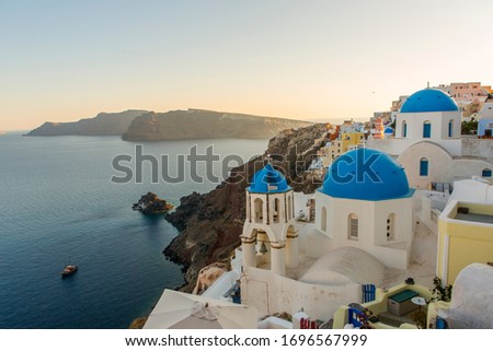 typical Santorini houses in Greece Royalty-Free Stock Photo #1696567999
