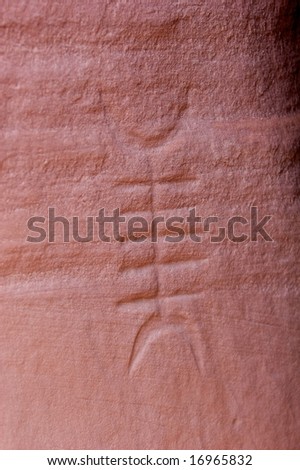 An image of carvings and ancient art on canyon walls