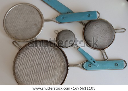 clean cooking utensils for daily use, empty dishes on a white table background