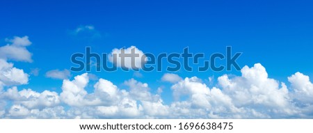 Blue sky with white clouds Royalty-Free Stock Photo #1696638475