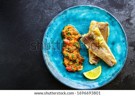 Fried fish fillet hake, seafood main course pescatarian
Menu concept. food background. top view copy space for text keto or paleo diet