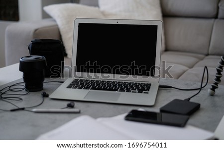 Living room office with and home decor. Photo editing. Photographer camera editor monitor design laptop photo screen photography - stock image