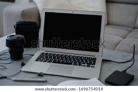 Living room office with and home decor. Photo editing. Photographer camera editor monitor design laptop photo screen photography - stock image