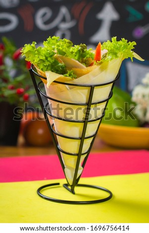 vegetarian wrap on a colorful background
