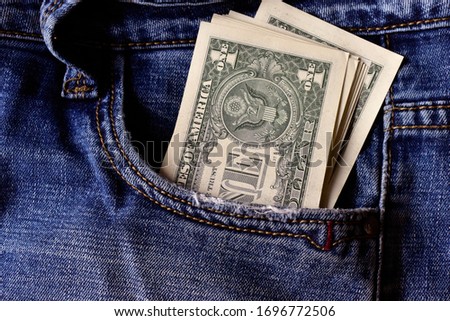 Dollar bills in your pants and jeans pocket