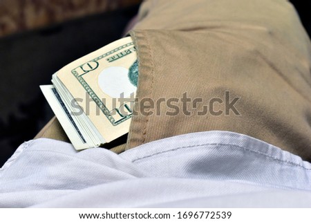 Dollar bills in your pants and jeans pocket