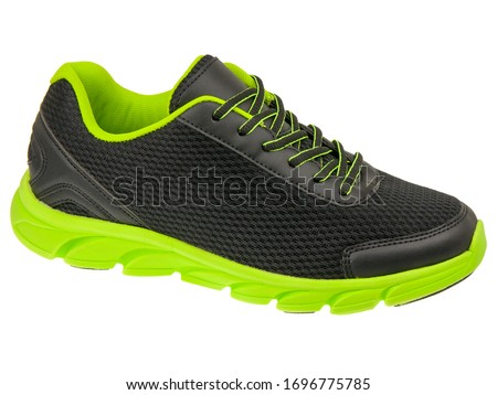 Casual sport green shoes for men, women and children isolated on white background