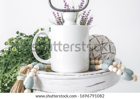 Blank 12oz white coffee mug on tier tray with farmhouse style decor, drinkware mockup