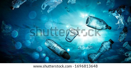 Plastic Pollution In Ocean - Underwater Shine With garbage Floating On Sea - Environmental Problem
 Royalty-Free Stock Photo #1696813648