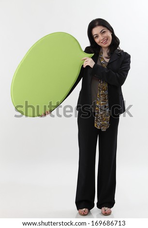 Full length of Asian Business woman holding a speech bubble