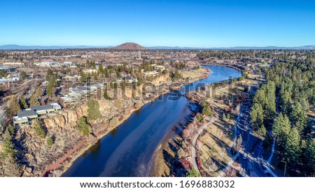 Aerial View of Deschutes River and Pilot Butte in Bend, Oregon Royalty-Free Stock Photo #1696883032