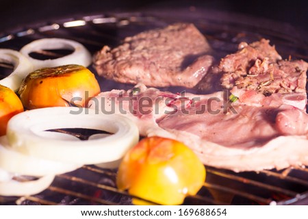 grilling a steak on the BBQ 
