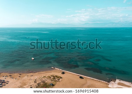 Aerial top view of summer beach and sea.Free space for your decoration and sunny summer day.Corfu island Greece 