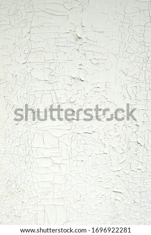 Cracked texture on white background. Old weathered paint