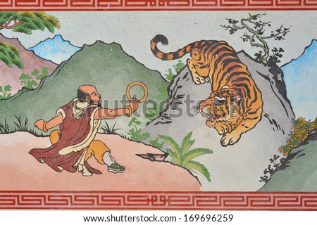 Chinese style painting on wall of shrine in Thailand