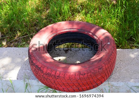 car tire painted in red