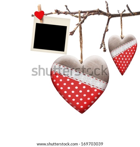 Valentine heart hanging on a tree branch