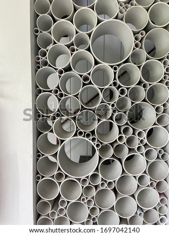 (Pipe Bubbles) Recycled pipes arranged to look like bubbles