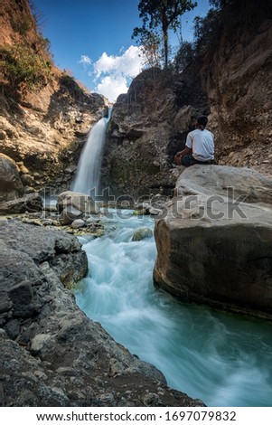 A beautiful waterfall in Sembalun District in Lombok Island, Indonesia named Madu Waterfall.
