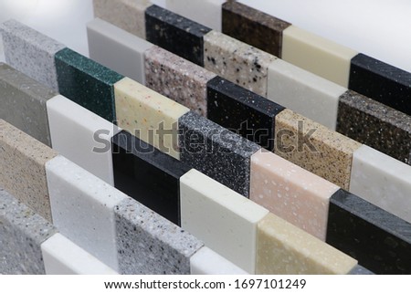 Surface of stone texture, Top view of color samples stone, Acrylic solid material for interior design. Royalty-Free Stock Photo #1697101249