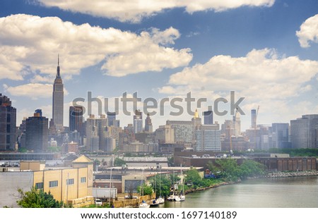 Midtown Manhattan skyline from Queens, panoramic city view.