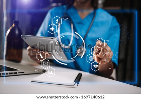 medical technology concept,smart doctor hand working with modern laptop computer with virtual icon diagram