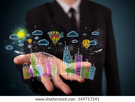 Young business man in suit presenting colorful hand drawn metropolitan city