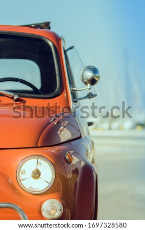detail of vintage car with headlight on