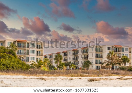 A nice three-story beach condominium complex Royalty-Free Stock Photo #1697331523