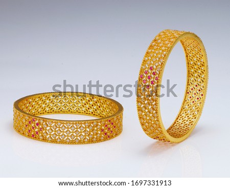 different type of gold ornaments bangles ,necklace Royalty-Free Stock Photo #1697331913