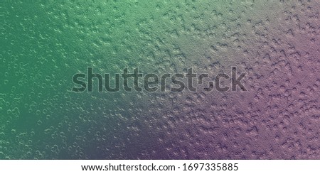 Texture of purple-green foil. Background texture.