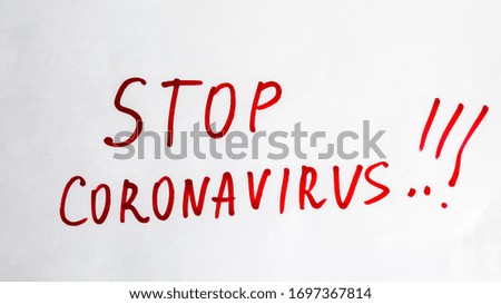 New Coronavirus - 2019-nKoV. Stop Coronavirus inscription with red marker on a white sheet. The concept of quarantine coronavirus in the world.