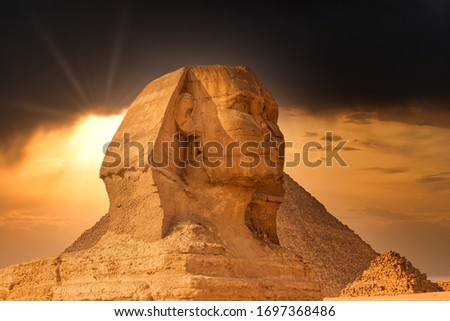 The Great Sphinx of Giza and the pyramids in Egypt Royalty-Free Stock Photo #1697368486
