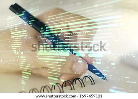 Abstract creative digital world map and man hand writing in diary on background, globalization concept. Multiexposure