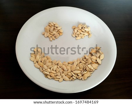 Pumpkin seeds, smile funny emoticon, healthy diet
